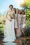 They always have my back. Portrait of a cheerful young bride and her brides maids standing together outside during the