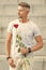 Having a date today. Handsome man going out on a date. Bearded man holding red rose for romatic date. Awesome first date