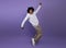 Having fun. Full length portrait of happy black teenage guy dancing on violet studio background