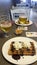 Having a waffle and a glass of beer
