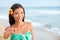 Hawaii beach smiling woman making shaka hand sign