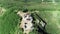 Hawaii, bird eye view with drone camera pan shot, people taking pictures on pill box world war II monument, color graded