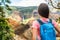 Hawaii hiking girl looking at Kauai waterfall