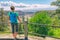 Hawaii hiking travel tourist hiker girl looking at view of Kilauea Iki crater lava field lake in Big Island, Hawaii