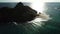 Hawaii, low angle view with drone camera moving forward, people enjoying a sunny day on the shore, color graded