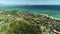 Hawaii, low angle view with drone camera moving forward, people hiking to pill box world war II monument, color graded