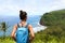 Hawaii travel nature hiker girl hiking in Pololu valley enjoying lookout view of mountains. Big island destination