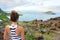 Hawaii travel woman tourist looking at makapuu lookout view of Waimanalo beach