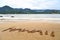 Hawaii word written on sand on hawaiian beach