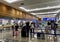 Hawaiian Airlines passengers line at check-in of International Airport in Honolulu