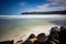 Hawaiian bay with rocks on a beach