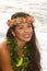 Hawaiian girl with flowers on lava