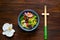 Hawaiian plate of salmon Poke with spicy. Homemade food. The concept of tasty and healthy meal. Copy space,wooden background