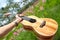 Hawaiian traditional instrument ukulele with hand