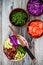 Hawaiian tuna poke bowl with seaweed, avocado, red cabbage, radishes and black sesame seeds.