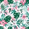 Hawaiian vector seamless pattern with pink flowers and green leaves. Stylish floral endless print for summer fabric design.