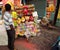 A hawker selling colorful plastic toys