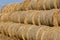 Hay bail harvesting in a field landscape