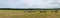 Hay bale field farm agriculture rural landscape panoramic meadow