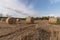 Hay bale at the field at sunset