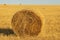 Hay bale. Haystack on rural nature on farmland, straw in the meadow