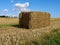 Hay bale stack grain crop in a field