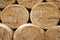 Hay bales. Close-up round hay bales stacked in stacks.