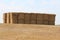 Hay bales on hilltop