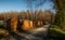 Hay bales on the Sile riverside north Italy at sunset.