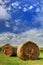 Hay bales under a blue sky II