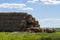 Hay in coils on the farm is stored for the winter.