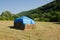 Hay packing on mountain field