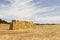 Hay packs piled up