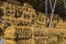 Hay storage with harvested bales of hay for cattle