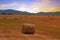 Haybales in the fields of Portugal at sunset