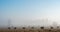 Haybales in Misty Field