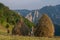 Haymaking and hay stack building in Apuseni Mountains, Transylvania, Romania