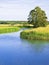 Haymaking on riverside