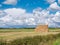 Haystack on field in polder near Oudeschild on West Frisian Island Texel, Netherlands