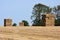Haystacks in Cropped Wheat Field
