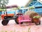 Haystacks and tractors parked in front of house.