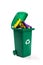 hazardous waste recycling - green wheelie bin full with batteries
