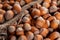 Hazelnuts, filbert on old wooden table. heap or stack of hazel nuts. Hazelnut background, healty food