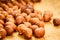 Hazelnuts on rustic old wooden table