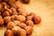 Hazelnuts on rustic old wooden table