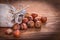 Hazelnuts sack on vintage wooden board food and