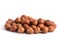 Hazelnuts without shell on a white background, isolated. Pile of hazelnut closeup