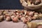 hazelnuts spilled on the table from a canvas bag close-up