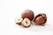 Hazelnuts whole and peeled on white background