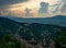 Hazy, misty mountain or hills landscape. Beautiful view with a cloudy sky from Tampa Mountain, Brasov